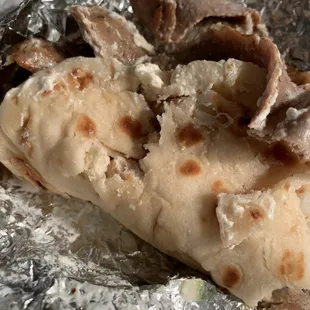 a burrito wrapped in foil