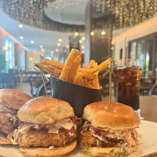 a plate of sandwiches and french fries