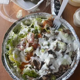 Gyro bowl, dolmas and hummus