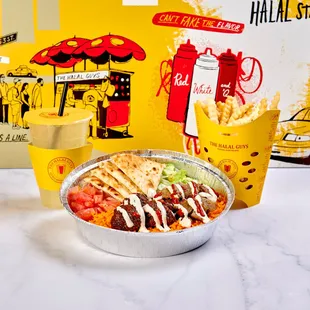 a bowl of food and a drink