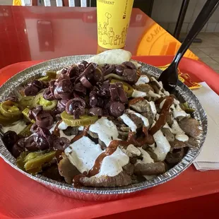 Gyro platter with olives and jalapeños, no rice. Keto-ish and very yummy.