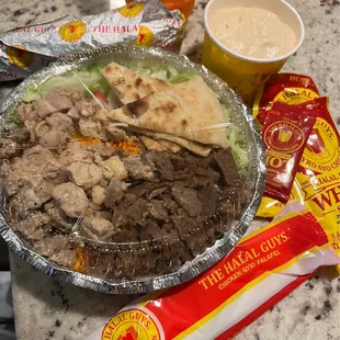 Chicken &amp; Beef Gyro Platter with side of Hummus and pita bread