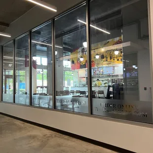 Walking through the building, customers can see the inside of The Halal Guys.