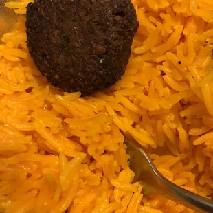 Burned falafel and neon orange rice.