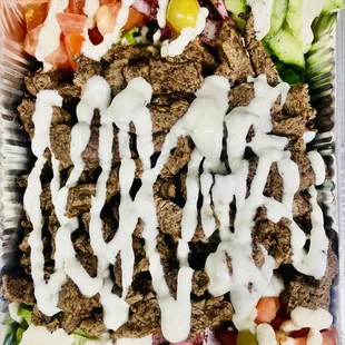 a salad with dressing