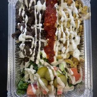 Mix shawarma over rice