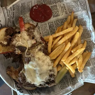 Philly cheesesteak on pretzel hoagie.