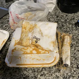 a partially eaten sandwich on a plate