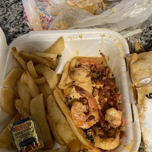 a meal in a styrofoam container