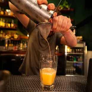 Whiskey Sour with Egg white being made