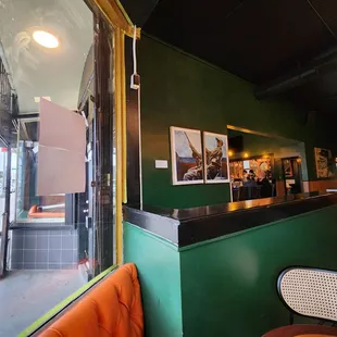 Entrance separating bar area and entrance dining tables.