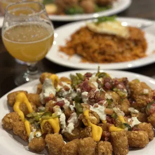 Tater tot nachos, kimchee fried rice, Korean chicken, Omakase