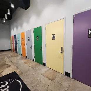 a row of brightly colored doors