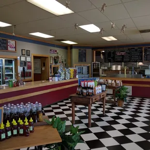a restaurant with a checkered floor