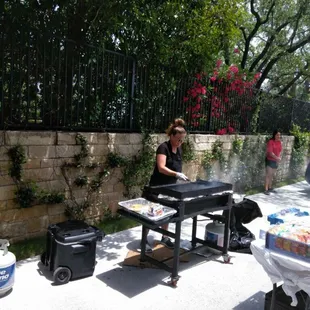 Jennifer cooking her first party.
