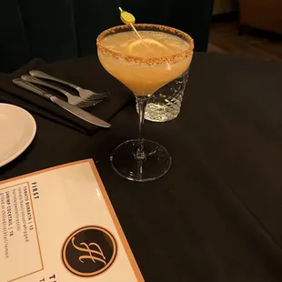 a cocktail in a martini glass