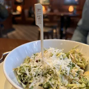 Brussels sprouts salad (split in 2 bowls) with allergy marker!