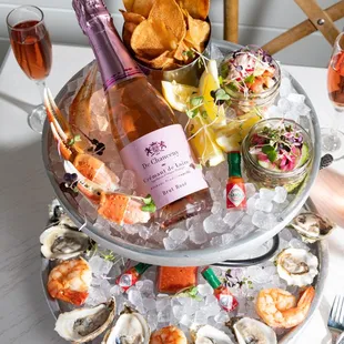 Sparkling Seafood Tower- oysters, shrimp cocktail, snow crab claws, tartare, ceviche, demi bottle sparkling rosé