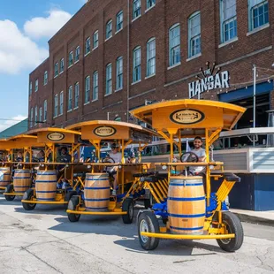 A fleet of 8 ready to come pick you up at your downtown location for your next team building event