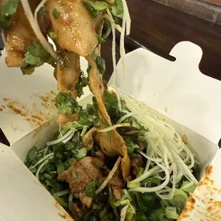 Stir fried with lamb $1 for noodle $3.5 extra for lamb , it adds up
