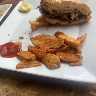 Half a French dip and potato wedges. split it with my wife.