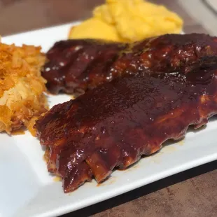 Slow roasted baby back bbq ribs smothered in a housemade sweet and tangy bbq sauce