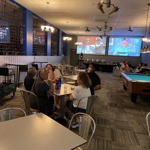 Seating 2 big tv also there buffet table under the tv