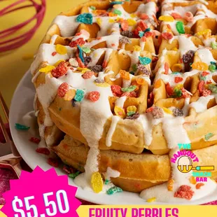 a plate of fruity pebbles waffles