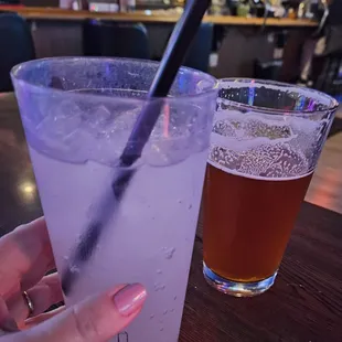 a person holding a drink