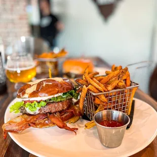 a burger and fries on a plate