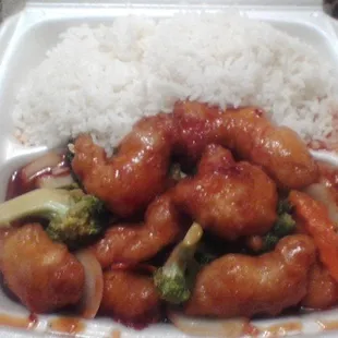 Princess Chicken with steamed rice. Dinner/lunch combo comes with crab rangoon, spring roll and soup.