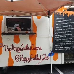 an orange and white food truck