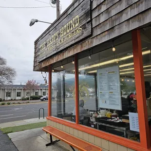 Outdoor sign next to the takeaway window