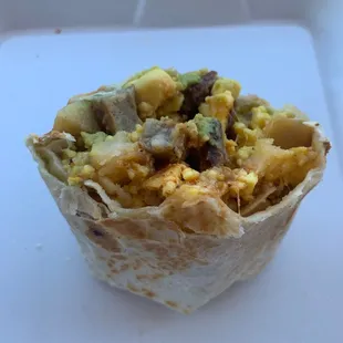 a breakfast burrito on a tray