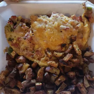 Overcooked awful eggs and potato.