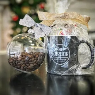 a coffee mug and a bag of coffee beans