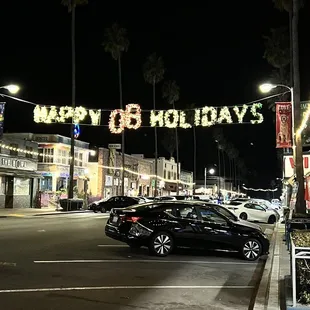 cars parked in a parking lot at night