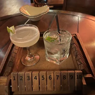 two cocktails on a tray