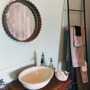 Wash basin, water closet, and old fashioned tub downstairs