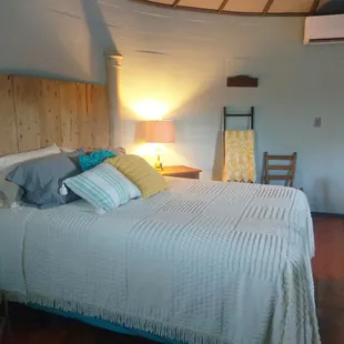 Queen bed loft exits to a sky deck with two seating areas