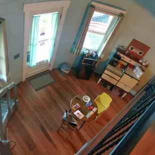 Looking down to the entry and living space from the loft