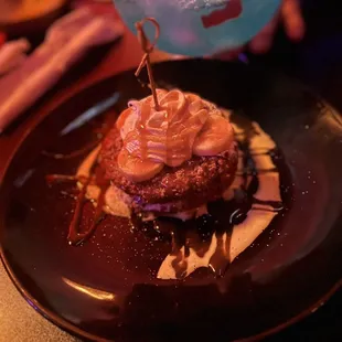 a chocolate cake and a blue drink