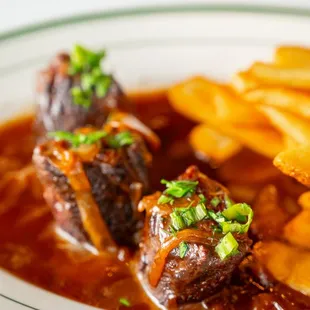 Steak &amp; Fries: 
8-oz Hanger Steak Fries. Caramelized Onion Pan Sauce.