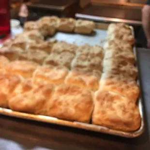 a close up of a tray of rolls