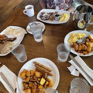 From top clockwise, The French Connection, the Hazel Plate, side of potatoes and tempeh, Bee Gee Breakfast