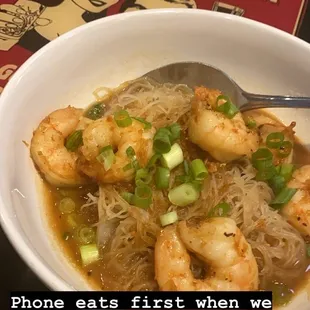 a bowl of noodles and shrimp