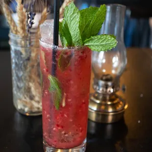 Rasmo - spiced rum with fresh raspberry and limes, delicious citrus&apos;y with the sour of the rasberry!
