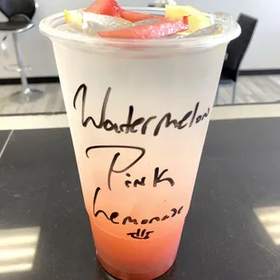 a drink in a plastic cup