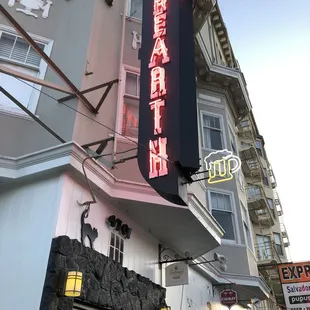a neon sign for a chinese restaurant