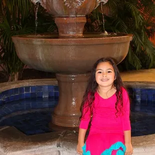 Juliet by the big fountain on the patio